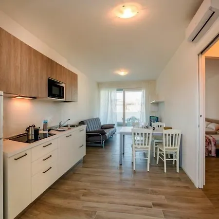 Condominio Giardino Бибионе